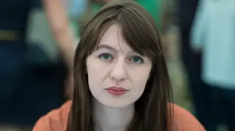 The acclaimed novelist claims she will not visit the UK over arrest fears
